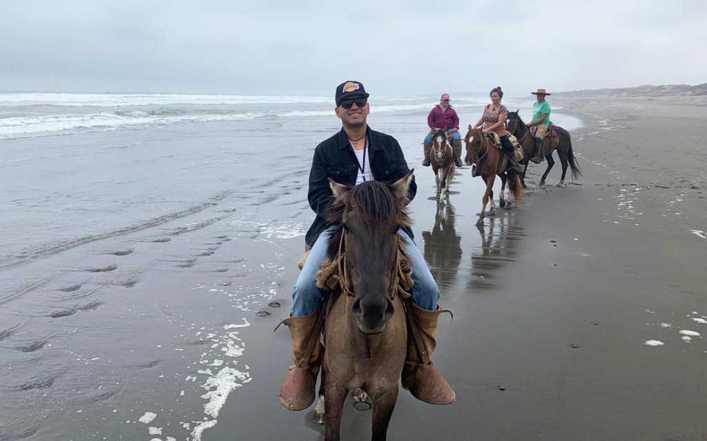 Horseback ride along Pacific Ocean
