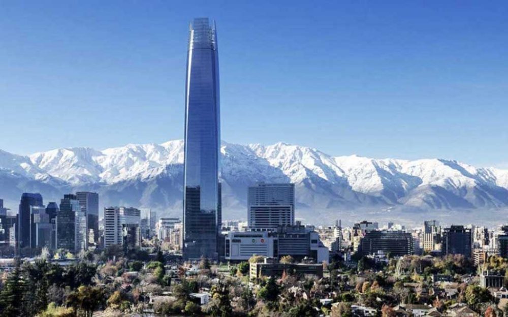 Costanera Center with snow-capped Andes Mountains. Santiago Tours