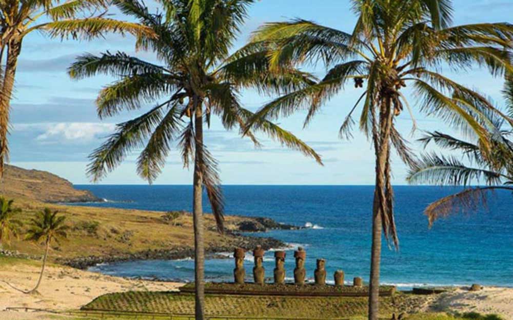 Moai stone statues on beach in Easter Island
