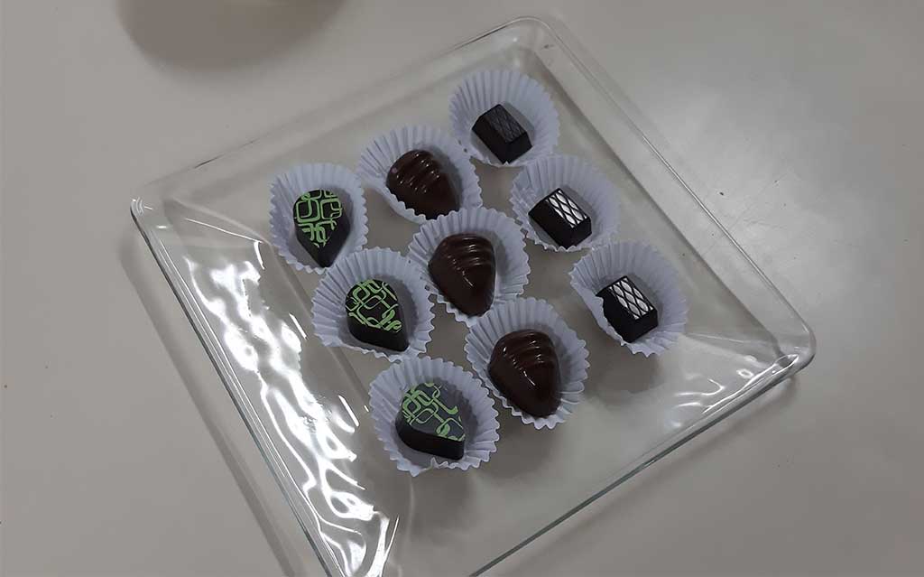 Chocolate sampling during tour at Mucane Xocolateria