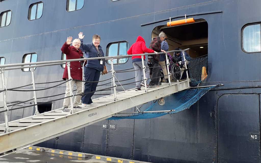 Guest on shore excursion in Punta Arenas boarding ship
