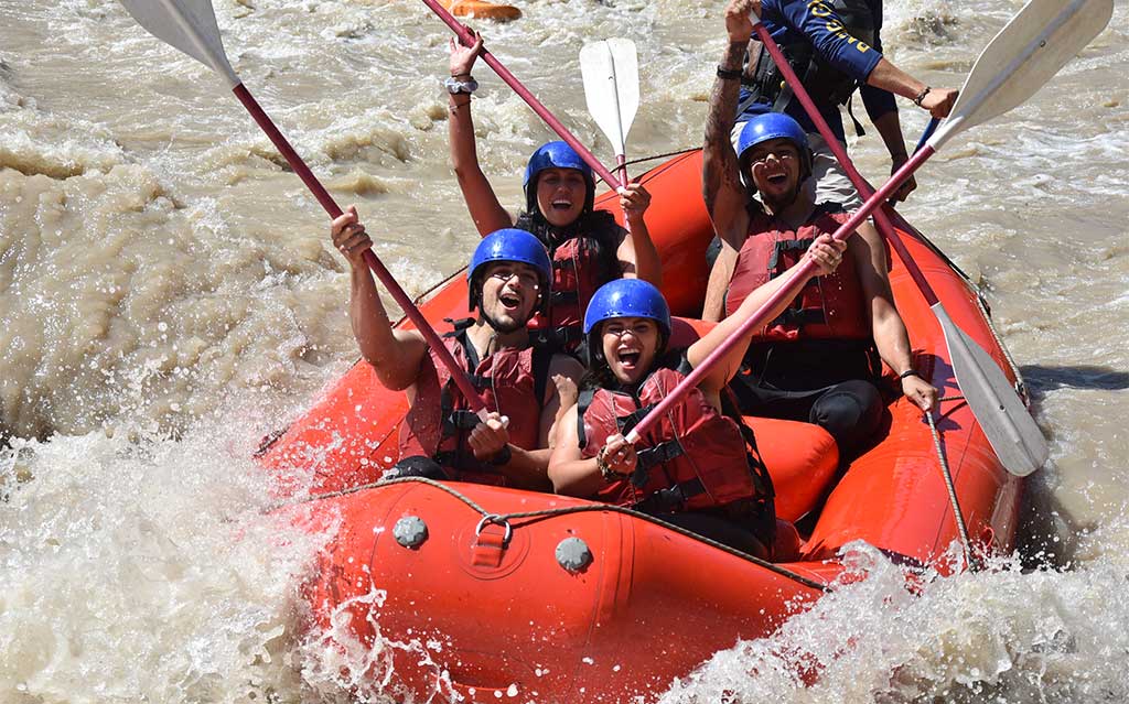 Our guests conquering the Maipo River on this fun rafting adventure